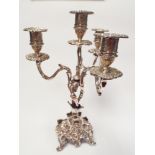 An ornate Rococo style silver plated 4 branch candelabra height 37cms