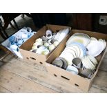 Three large boxes containing Poole Pottery dinner service