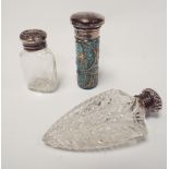 A hallmarked silver topped overlaid cut glass scent bottle with hallmarked silver screw on lid and