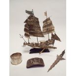 Oriental white metal model of a galleon, napkin ring,