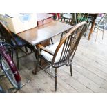 Refectory style table with six wheel back chairs,