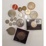 A small collection of coins and medallions to include an 1817 George III shilling,