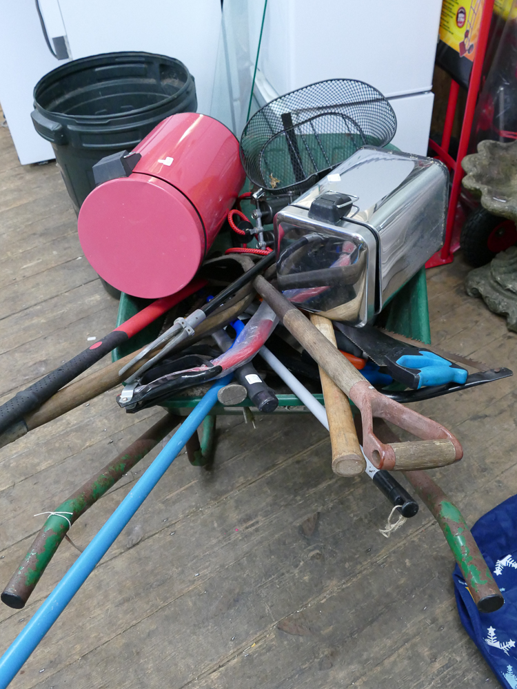 Wheelbarrow containing qty of hand tools, foot pump etc.