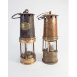 2 miners safety lamps