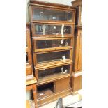 Six section oak Globe Wernicke style glazed bookcase with covered bottom section