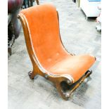 A small Victorian mahogany framed hammock style occasional chair in terracotta dralon