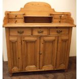 Victorian stripped pine sideboard fitted 3 drawers and cupboards with small shelf and drawer back -