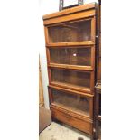 Mahogany four section Globe Wernicke style glazed bookcase with drawer under 34" wide