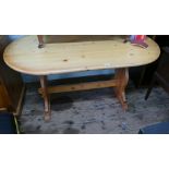 Oval pine varnished kitchen table