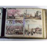 Japanese lacquered post card album inlaid with Mother of Pearl and Abalone shell inside are