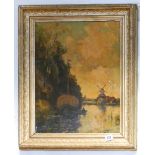 A decorative picture of a Dutch scene in gilt frame