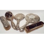 Group of 2 silver backed hand mirrors and 3 brushes,