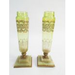 Pair of green and gilt etched glass pedestal vases standing on onyx bases height 21cm tall