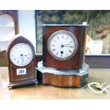 Arched top mantel clock and a late Victorian clock with key