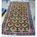 Persian design rug on orange and burgeoned background with geometric pattern to the centre