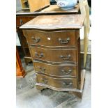 Walnut serpentine fronted chest of four drawers in need of a polish