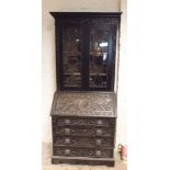 3' Victorian Carved dark oak glazed bureau bookcase with lion mask handles