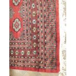Large red and patterned Bokhara rug approx 13' x 10'