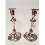 A large pair of Sheffield plated candlesticks one sconce as found height 18cms