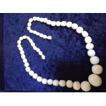 Row of Victorian graduated ivory beads