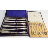 A set of 6 Mappin & Webb silver teaspoons in a fitted case and some silver handled tea knives