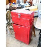 Red metal toolbox on wheels and one other red metal toolbox