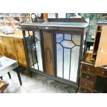 Large mahogany china cabinet with 2 glass shelves standing on claw and ball feet