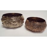 A pair of Indian silver plated embossed bowls the larger diameter 18cms