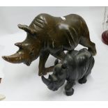 Heavy marble rhinoceros ornament and a smaller black rhino