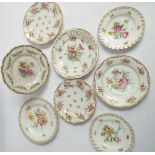 Collection of 8 Dresden hand painted cabinet plates decorated with floral sprays