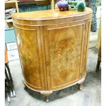 Demi lune figured walnut cocktail cabinet with fitted one large cabinet door