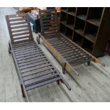 Pair of teak steamer lounger garden chairs