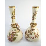 Large pair of Royal Worcester blush ivory narrow necked vases painted with wild flower sprays with