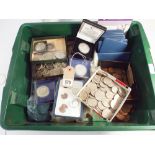 Large accumulation of British coins contained within a large green crate to include crowns,