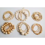 A collection of six Victorian ivory bead necklaces