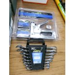 Heavy duty stapler and nail gun with accessories and a new 8 piece combination spanner set