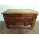 Small antique carved French oak coffer with fancy strap hinges measurements 85cms wide,