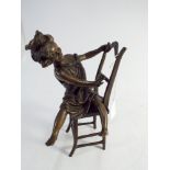 Contemporary green patinated bronze of a young girl seated on a chair - height 23cm