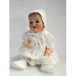Simon and Halbig German bisque head doll with flirty eyes, numbered 126.