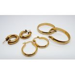 Three pairs of gold hoop earrings - unmarked. Handmade. Gross weight 14.