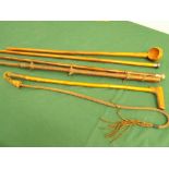 A bundle of 5 walking canes to include 2 with silver handles