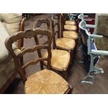 Set of six French ladder back dining chairs with rush seats