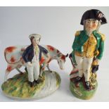 Staffordshire figurine of a farmer and a cow and a Nelson jug - height 31cm