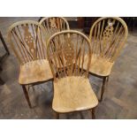 Set of four elm wheelback windsor dining chairs