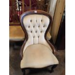 A reproduction Victorian style balloon backed occasional chair in fawn covering