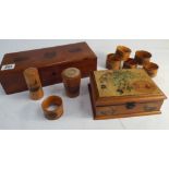 Group of treen Mauchline ware to include 6 napkin rings,