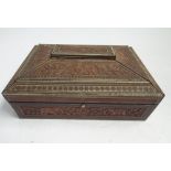 Old Huntley and Palmers biscuit tin in the form of an Indian hardwood box