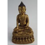 Cast brass seated Buddha - height 30 cm tall