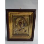 A late 19th early 20th century icon in a glazed mahogany box style frame