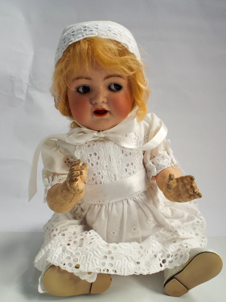 Simon and Halbig German bisque head doll with flirty eyes. Head numbered 126.